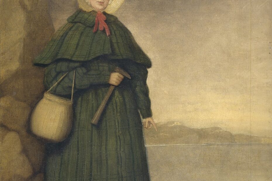 Mary_Anning_painting_Credited to 'Mr. Grey' in Crispin Tickell's book 'Mary Anning of Lyme Regis' (1996) Pioneer fossil collector of Lyme Regis, Dorset. Oil painting by an unknown artist, before 1842. Golden Cap is visible in the background. Held at the Natural History Museum, London.