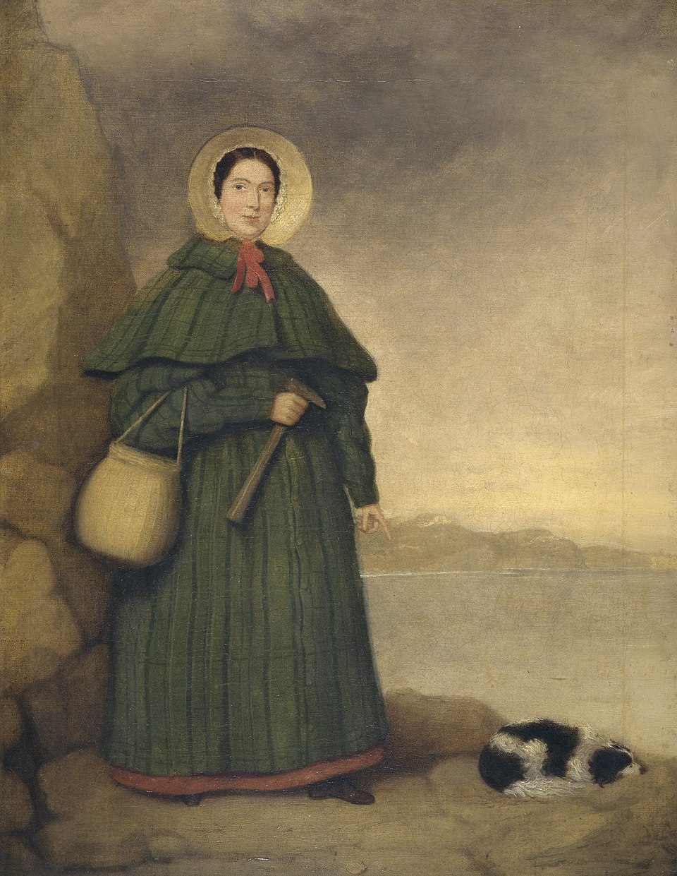 Mary_Anning_painting_Credited to 'Mr. Grey' in Crispin Tickell's book 'Mary Anning of Lyme Regis' (1996)Pioneer fossil collector of Lyme Regis, Dorset. Oil painting by an unknown artist, before 1842. Golden Cap is visible in the background. Held at the Natural History Museum, London.